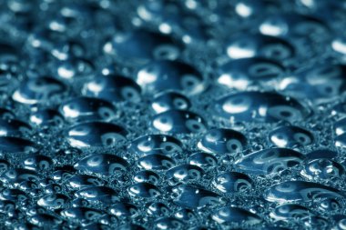 Water drops on polished metal surface