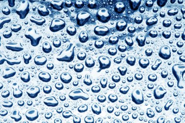 Water drops on polished metal surface