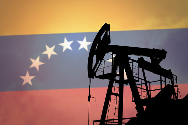 Нефтяной насос с флагом Венесуэлы
