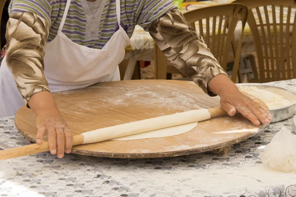 Woman preparing traditional pastries — Stock Photo, Image