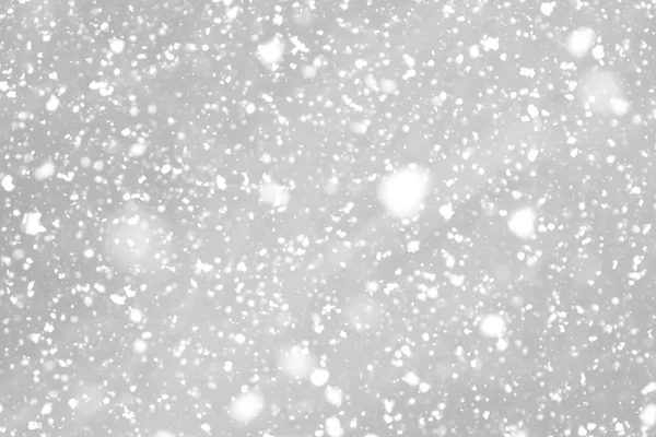 Snowfall  on gray background — Stock Photo, Image