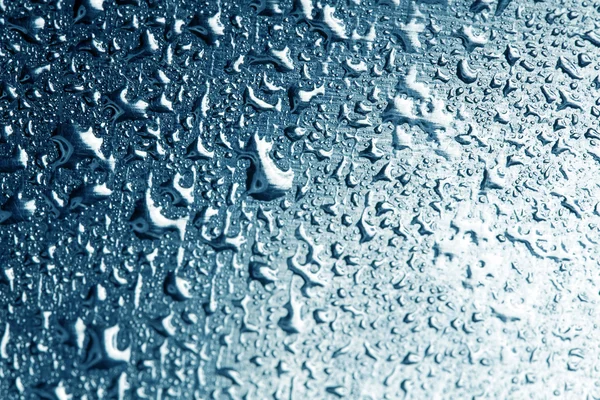 Water drops on polished metal surface — 스톡 사진