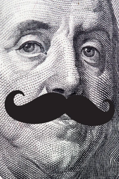 Face on dollar bill with mustache — ストック写真