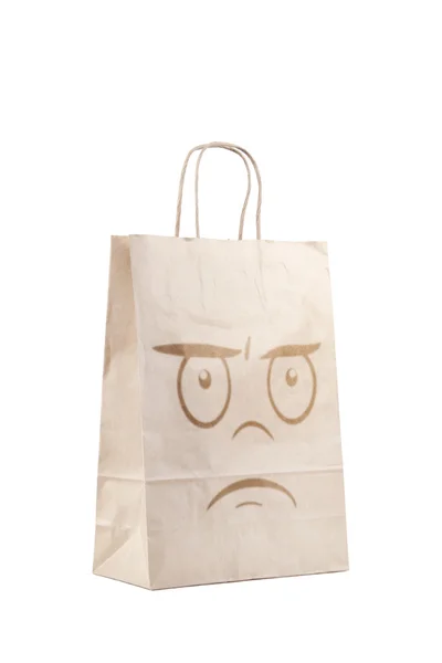 Paper bag with doodle face print — Stockfoto