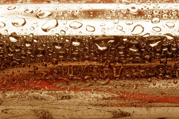 Water drops on polished metal surface — Stock Photo, Image