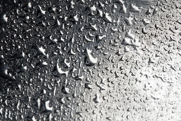 Water drops on polished metal surface — Stock Photo, Image