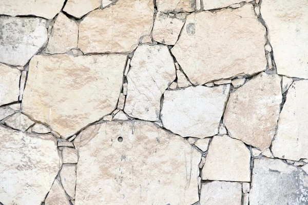 Starý šedý kámen zeď textura — Stock fotografie