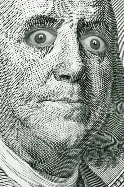 Caricature Franklins face on dollar bill — стокове фото