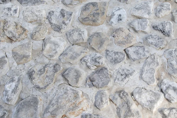 Old gray stone wall texture — Stock Photo, Image