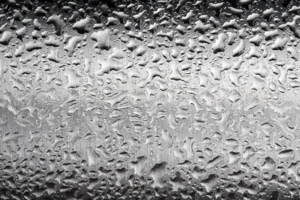 Gotas de agua en la superficie de metal pulido — Foto de Stock