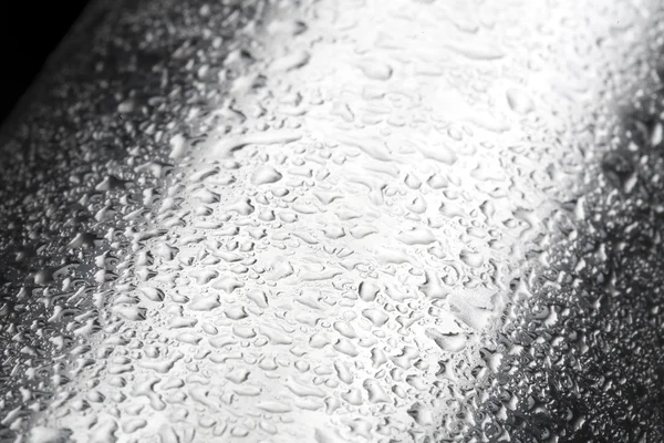 Water drops on polished metal surface — Stockfoto