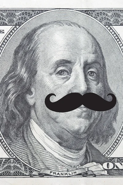 Face on dollar bill with mustache — Stockfoto