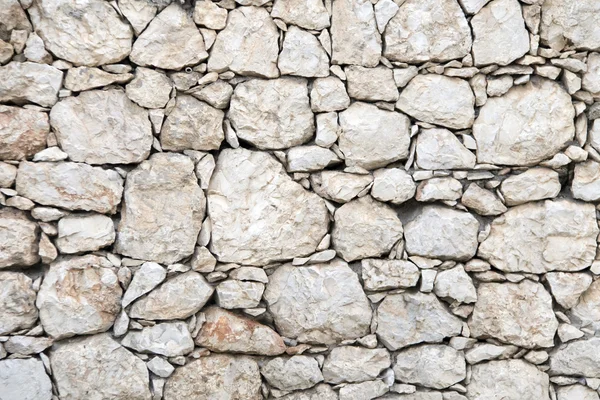 Oude grijze stenen muur textuur — Stockfoto