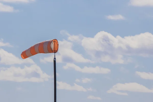 Striped airsock in blue sky — Stock Photo, Image