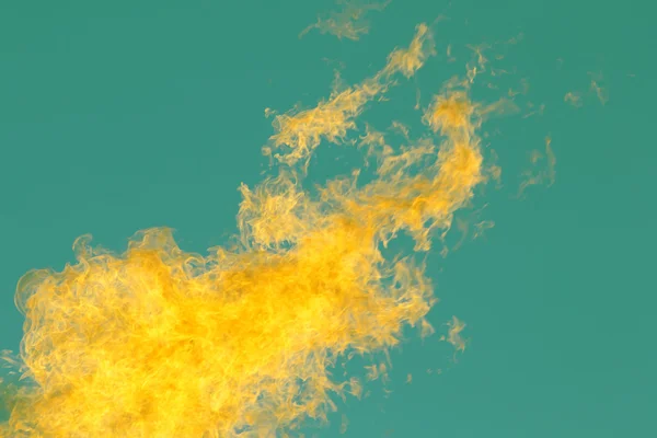 Flames against the blue sky — Stock Photo, Image