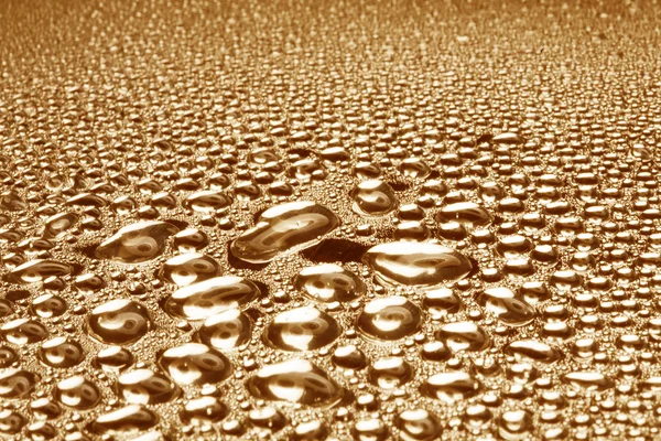 Water drops on polished metal surface — Stock Photo, Image