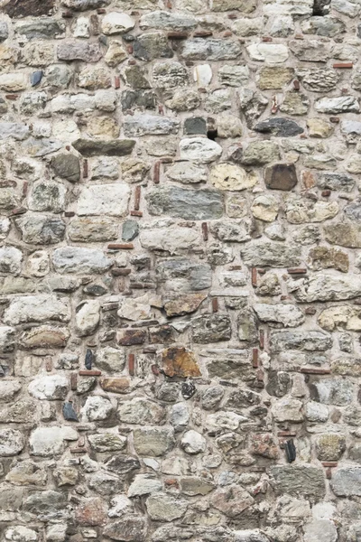 Vecchia struttura della parete di pietra grigia — Foto Stock