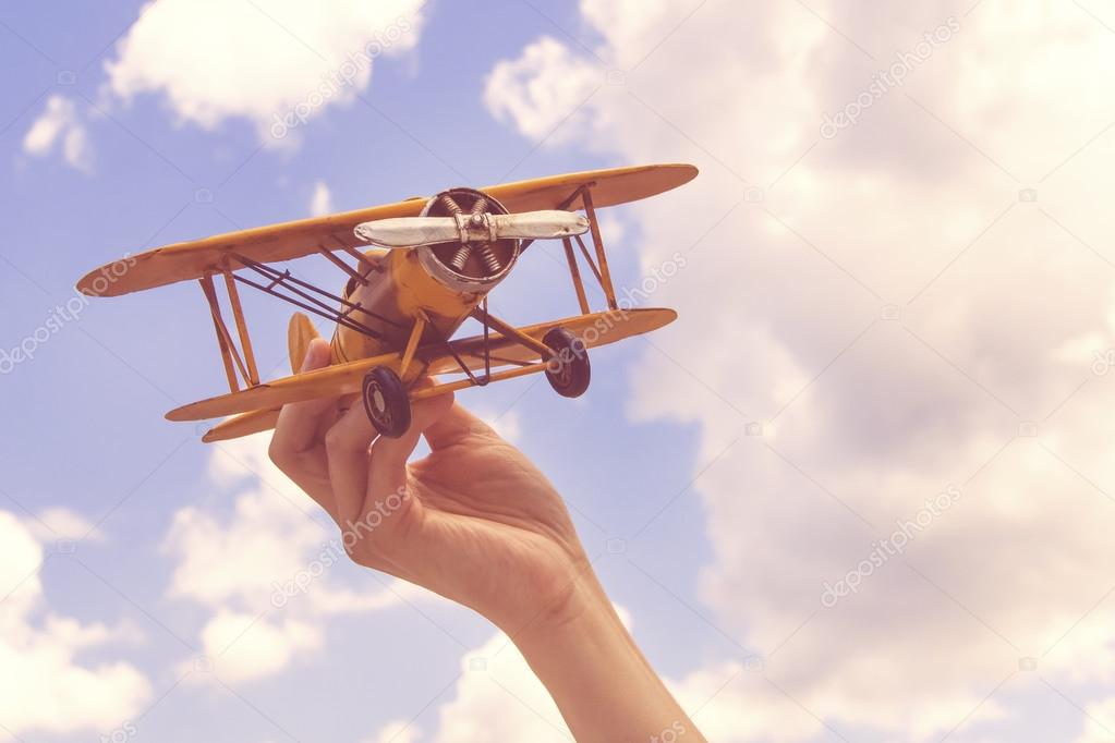 Yellow, retro airplane model