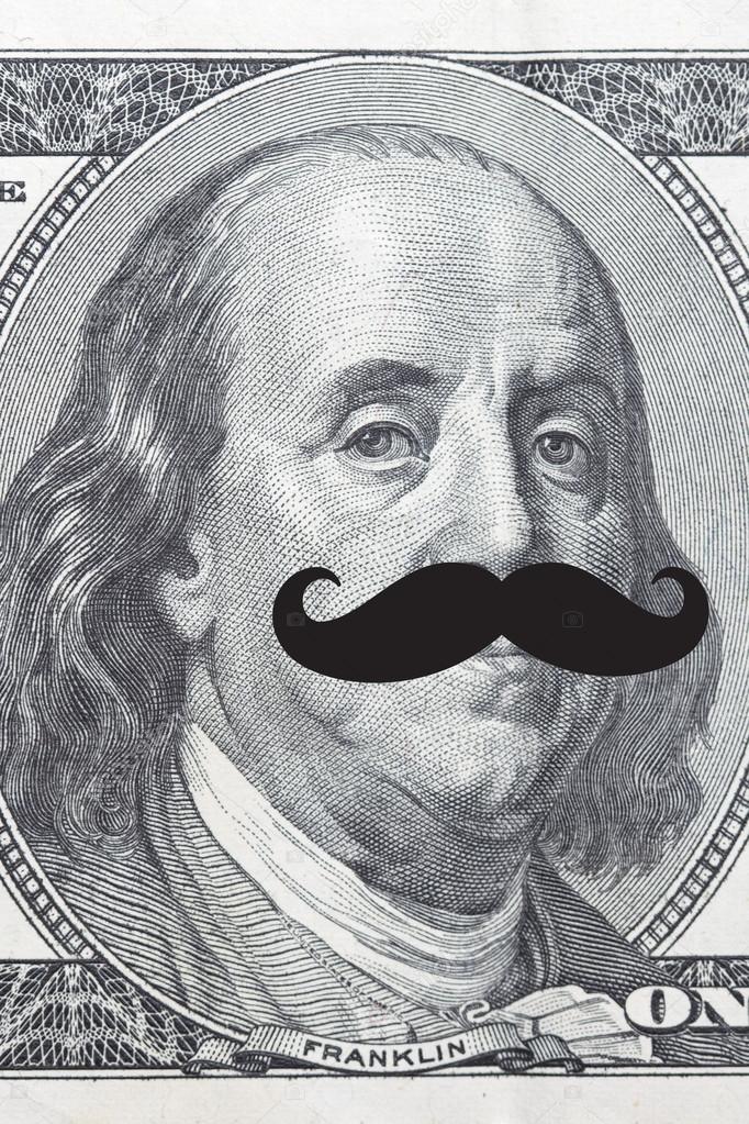 Face on dollar bill with mustache