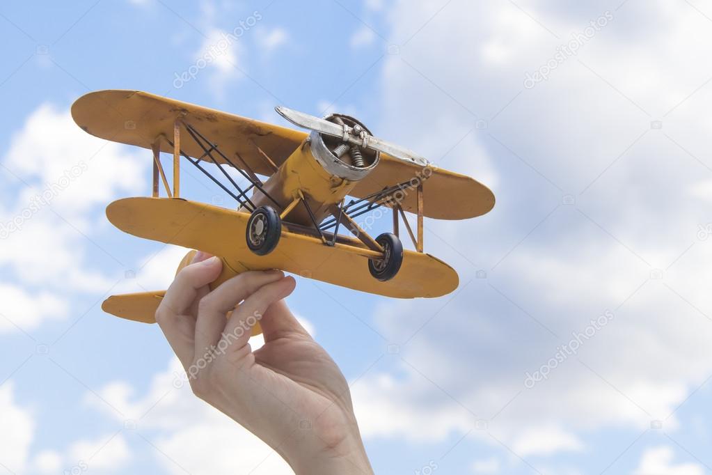 Yellow, retro airplane model