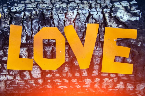 Burning paper love inscription — Stock Photo, Image