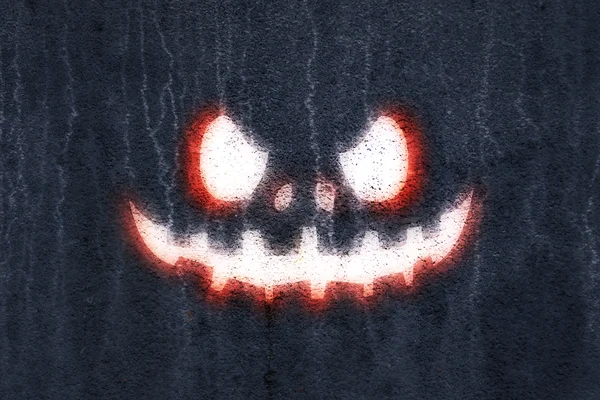Светящееся лицо на Хэллоуин — стоковое фото