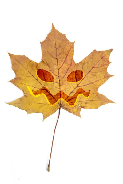 Dry leaf with halloween face — Stock Photo, Image