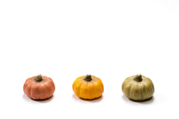 Three small colorful pumpkins — Stock Photo, Image