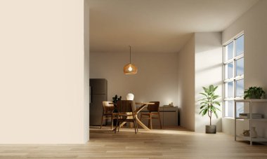 Ahşap bir yemek masası, rahat sandalyeler ve modern ortamda çarpıcı bir aydınlatma armatürü olan parlak bir yemek alanı..