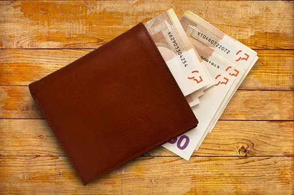 LEATHER WALLET AND MONEY — стоковое фото