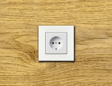 Duvarda beyaz elektrik prizine