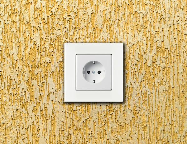 White electric socket on wall — Stock Photo, Image