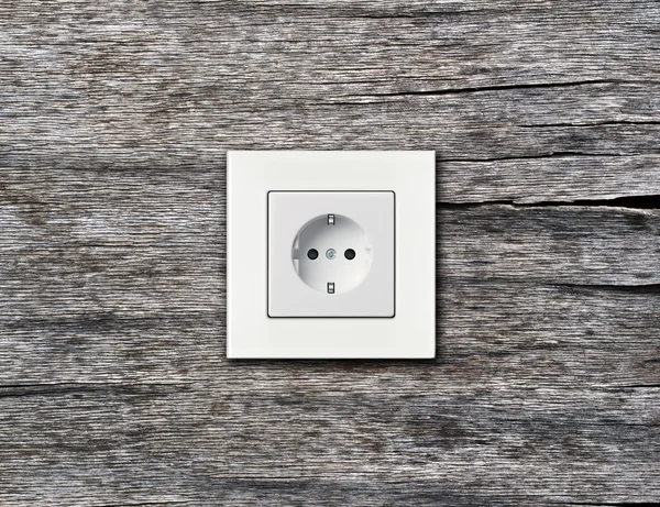 Duvarda beyaz elektrik prizine