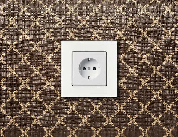 White electric socket on wall — Stock Photo, Image