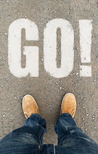 Man on a tarmac road