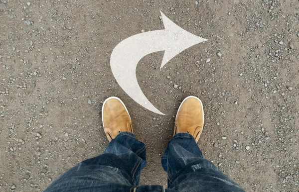 Yellow boots on the road — Stock Photo, Image