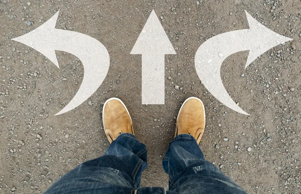 Yellow boots on the road — Stock Photo, Image