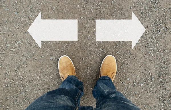 Yellow boots on the road — Stock Photo, Image