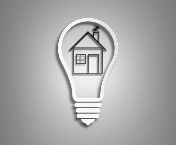 Electric light bulb and house inside it — Stock Photo, Image