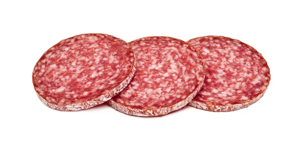 Scheiben Salami, isoliert auf weißem Hintergrund. — Stockfoto