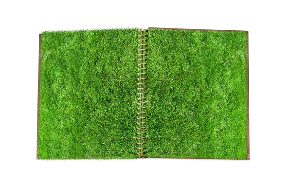 Cuaderno con página de hierba verde . — Foto de Stock