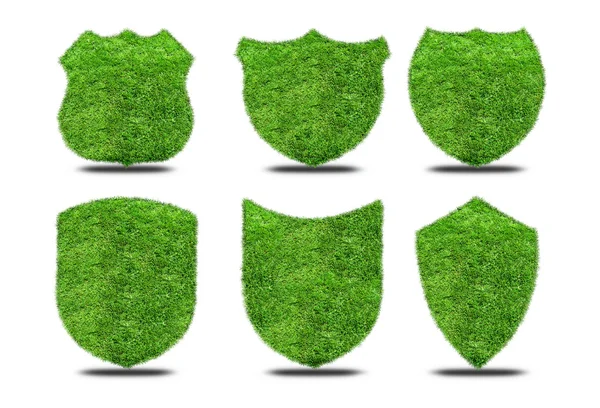 Set green grass shields on white background — Stock Photo, Image