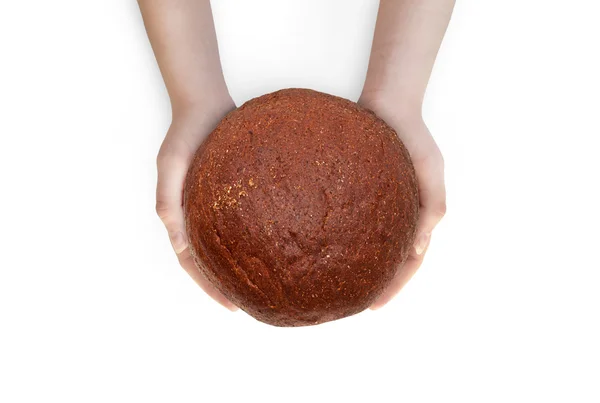 Vrouwen houdt een brood in zijn handen — Stockfoto