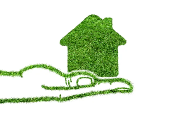 Grüne Gras Home-Ikone in der Hand — Stockfoto