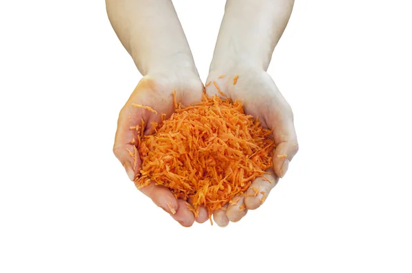 Grated carrots in hands. — Stock Photo, Image