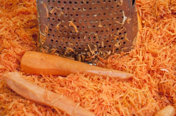 Grated carrots on the table.