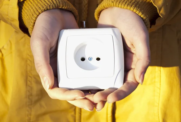 Electric socket in hands. — Stock Photo, Image