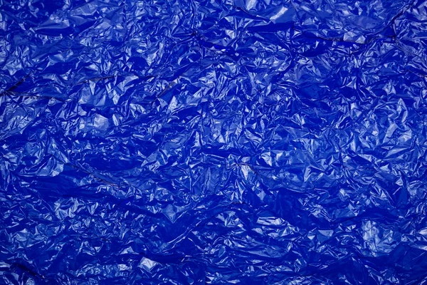 Cellophane Stropicciato Brillante Blu Trasparente Carta Plastica Texture Sfondo Astratto — Foto Stock