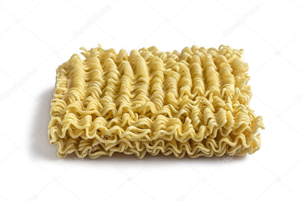Briquette of cheap dry instant noodles, isolated on a white background. Cheap Thrifty Asian food