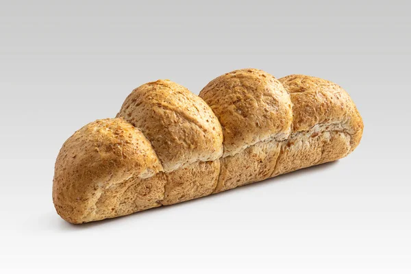 Brood Van Tarwehaver Met Een Gouden Korst Een Lichte Ondergrond — Stockfoto